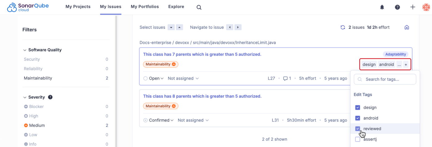 An issue's tags are managed on the right-hand side of the issue's description. Select the + sign to manage an issue's tags.
