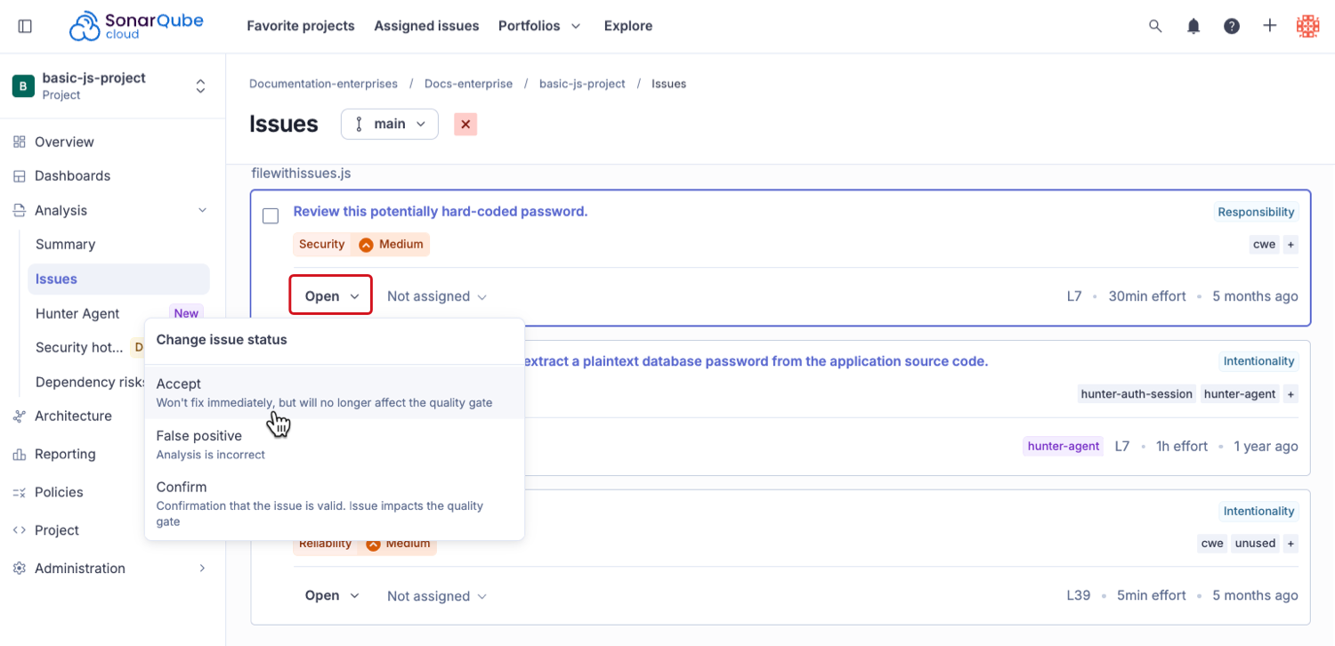 Issues page of a project in SonarQube Cloud with the Change issue status menu open on an issue, showing the Accept, False positive, and Confirm options.